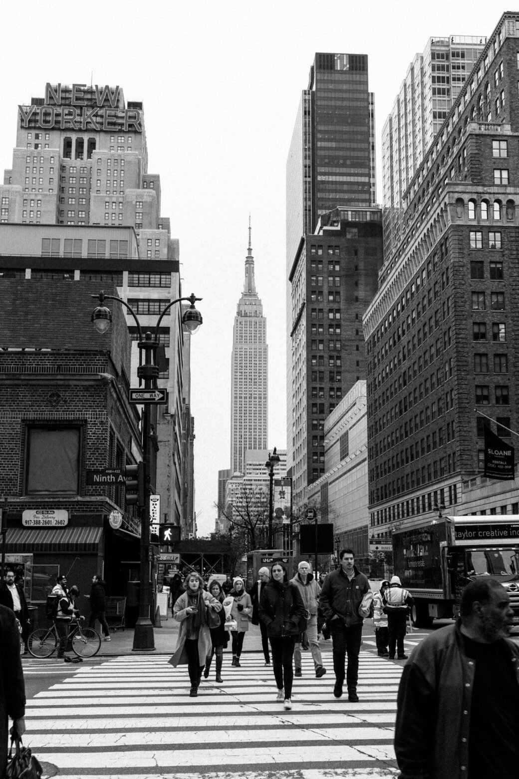 Black and white photo of a busy New York City street