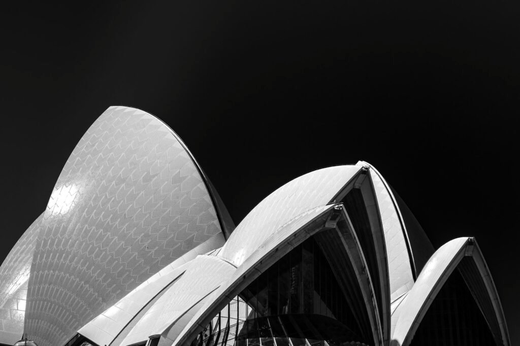 Black and white photograph of Sydney Opera House and harbour, symbolising the elite tier of the Sydney AI recruitment market