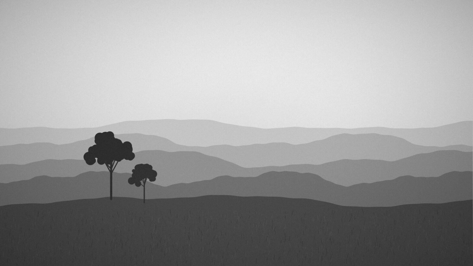 Monochrome Australian ranges receding into haze